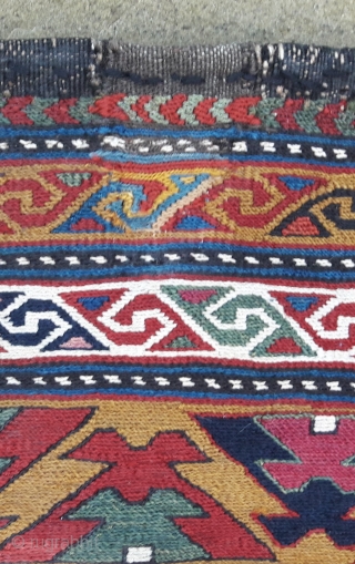Pair of early 20th century Caucasian mafrash end panels, stunning saturated colours,
and very fine weave. Quality items, each 22in by 20in Small ares of reweave (see detail pics)     
