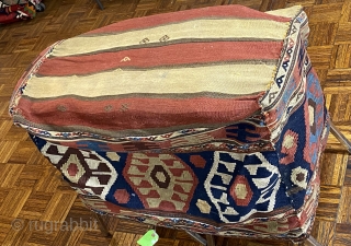 Shahseven kilim cargo bag, 2’10” x 1’10” x 1’9”/ 86 x 56 x 53 cm.

Decorated on four sides with hexagons inhabited by hooked diamonds. On the bottom with red

and yellow stripes.  