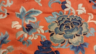 1’1 x 1’3 Chinese Embroidery Panel, 19th Century, featuring peony blossoms and 
butterflies embroidered in shades of blue and white on persimmon orange          