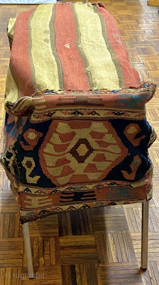 Shahseven kilim cargo bag, 2’10” x 1’10” x 1’9”/ 86 x 56 x 53 cm.

Decorated on four sides with hexagons inhabited by hooked diamonds. On the bottom with red

and yellow stripes.  