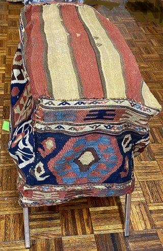 Shahseven kilim cargo bag, 2’10” x 1’10” x 1’9”/ 86 x 56 x 53 cm.

Decorated on four sides with hexagons inhabited by hooked diamonds. On the bottom with red

and yellow stripes.  