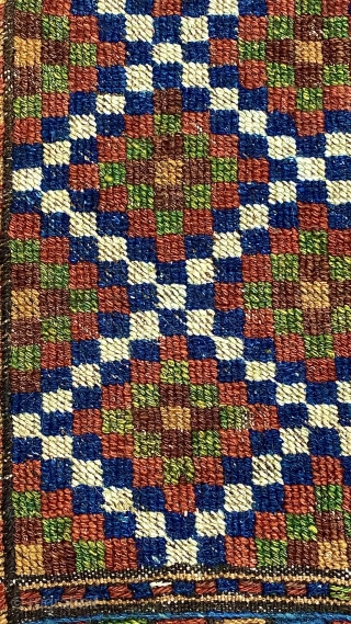 Quchan Kurd Soumac small carpet, ca.1890;
5’4” x 8’11” / 163 x 272 cm.  Field populated by a 
diaper pattern of concentric stepped diamonds, 
with an “elem” panel of diamonds set between  ...