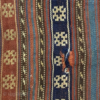 Jajim, ca. 1890; 5’9” x 6’0” / 175 x 183 cm.

Field adorned with multicolored bands and totemic symbols, wear at the sides, a few discreet 

holes, and one re-sewn cut.   