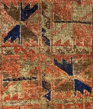Afghan Balauch rug, ca. 1880;  3’4” x 6’6” / 102 x 198 cm.;

Field of “boxed cabbage” leaves and a running dog border variant as 

trunks and branches. Main border cross-hatch totems  ...