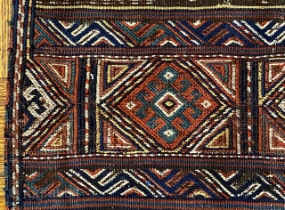 Kurd Qoo-chan Soumac Bagface, ca.1890; 2’9 x 2’4” / 79 x 71 cm.

Decorated with bands of hooked diamonds not unlike symbols seen

on Jaf Kurdish work here set in boxes. Halved diamonds fill  ...