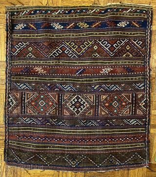 Kurd Qoo-chan Soumac Bagface, ca.1890; 2’9 x 2’4” / 79 x 71 cm.

Decorated with bands of hooked diamonds not unlike symbols seen

on Jaf Kurdish work here set in boxes. Halved diamonds fill  ...