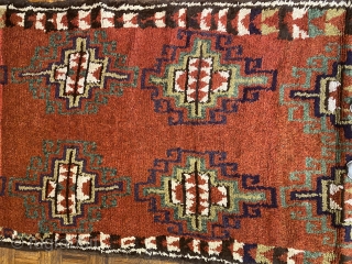 Uzbek long rug/ carpet with Gabbeh weave, ca. 1890, 4’11” x 11’9” / 150 x 358 cm.

Three shade of red in the ground, two madder reds and one slightly tip-faded red-violet which  ...