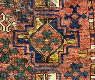 Uzbek Small Carpet or Large Rug, ca. 1890; 4’8” x 12’6”

Overall pattern of Chuval-gul variants with fluidly rendered totemic 

figures between.

Small areas of wear, tiny areas of repiling-please study photos carefully  