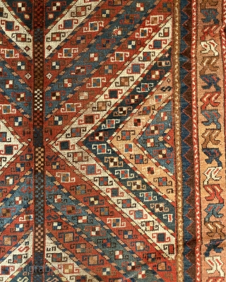 NWP Long Rug, ca. 1850; 4’2” x 9’4” / 127 x 284 cm

Field composed of brightly colored, diagonal stripes converging at central trunk or stem.

possibly an abstracted tree. Stripes in madder red,  ...