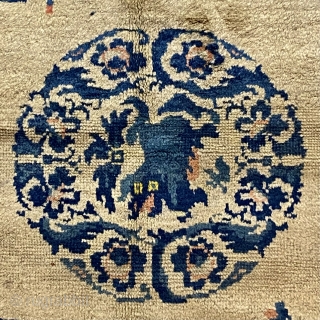 Ningshia Chinese Rug, 19th C; 3’11” x 5’ 10” / 119 x 178 cm

Foo-Dog medallion at center of field with arrangements of

meritorious “scholars’ objects”. Fret-work dragons in the 

main border woven in  ...