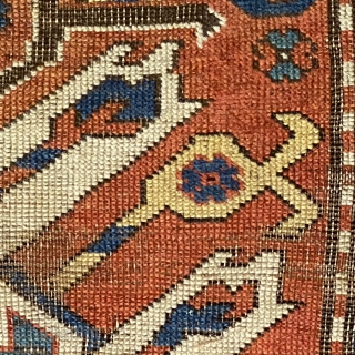 Antique Eagle Kazak, ca. 1875 or earlier; 4’7” x 7’3”

Nice early rendering of the “Eagle” motif with beautiful saturated natural 

colors. Many overt and implied animal heads/faces. Eight monocular creature-

flowers in clear  ...