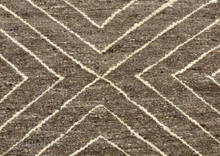 Moroccan flatwoven runner, ca. 20th C., 3’3” x 14’7” / 99 x 444 cm

Rows of linear chevrons in white ivory wool, pointing towards the center from the ends, on polychromatic grey-brown wool

un-dyed  ...