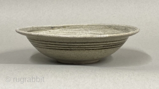 Antique Thai Ceramic Bowl, ca. 14th-15th Century;

Diameter: 9 1/4” // 23.5 cm; Height: 2 1/2” // 6.35 cm; Base diameter: 3 3/8” // 8.6 cm

Details in dark green brown glaze over a  ...