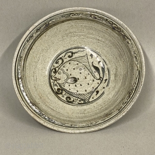 Antique Thai Ceramic Bowl, ca. 14th-15th Century;

Diameter: 9 1/4” // 23.5 cm; Height: 2 1/2” // 6.35 cm; Base diameter: 3 3/8” // 8.6 cm

Details in dark green brown glaze over a  ...