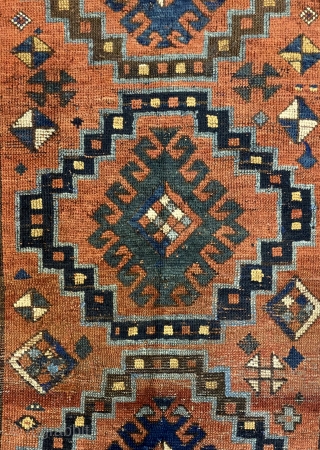 Antique Kazak Rug, ca.1880; 4’1” x 6’4” / 124 x 193 cm

Three medallions, loosely diamond shaped, with hooked diamond centers, populate 

the dark salmon pink  field, surrounded by a sawtooth border  ...