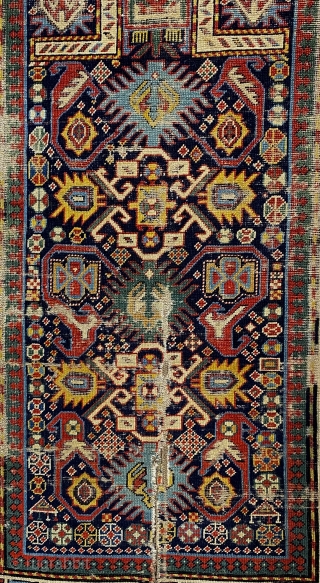 Bidjov Kuba Caucasian prayer rug m, ca. 1880; 3’6” x 5’4” / 106.7 x 163 cm

Indigo field with numerous totemic creatures, and stylized flowers.  Mihrab 

arch woven in ivory white. Trefoil  ...