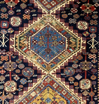 Antique Shirvan Karagashli Caucasian rug, ca. 1870; 4’ x 7’ / 122 x 213 cm

Three multicolored hexagonal diamond medallions and red-palmette finials set

on a deep indigo field. Multitudinous totemic emblems resembling flower-heads

surround  ...