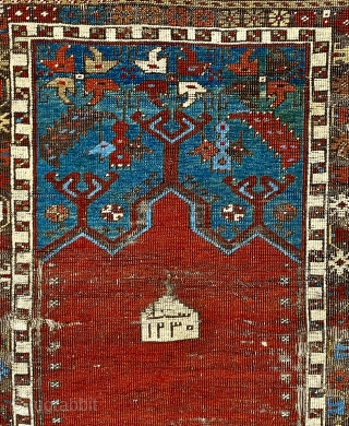 Antique Ladik Prayer rug, dated A.H. 1230 ( 1815 CE); 3’7” x 6’5”

Woven a relatively long vertical shape, this Ladik features the classic

arrangement of a red, triple-arch mihrab set above a panel  ...