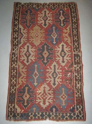 Caucasian Kilim.....Kuba.....most probably well before 1850.....4'8" x 8'....
 (143cm x 245cm )the unusual size ....salt and pepper warps...floppy handle and the limited color palette are some of the reasons I think this  ...