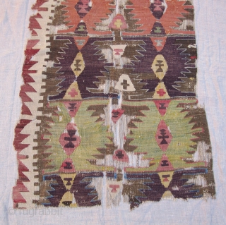 Konya Kilim Fragment......before 1850....approx. 2/3rds of one 1/2....fragment size 2'3 x 7' ( 69 x 213 cm ) with some selvedge.....profess.mounted on linen          