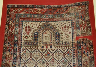 Caucasian Shirvan Prayer Rug. 
Mounted/size of the linen support(Full size): 110 x 182cm (size of the rug fragment: 100 x 172cm). 19th century, I was told over 150 years old. Provenance: The  ...