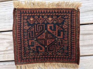 Antique Baluch chanteh. 10" x 12". Beautiful colors and tight knots. Couple small moth bites otherwise full pile.               