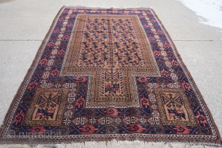 Wonderful 19th century Antique Baluch prayer rug. It's mostly medium pile with some colors which have corroded over the years. Soft wool. Rare with the rosettes on the main tree of life  ...