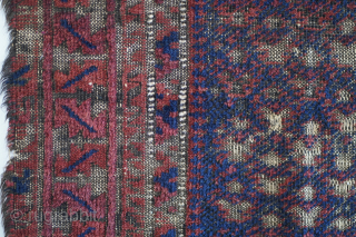 This dukhtar e qazi Baluch prayer rug folds like a cloth and has some of the more intense oxidation I've seen. It's one of the older pieces of this type that I've  ...