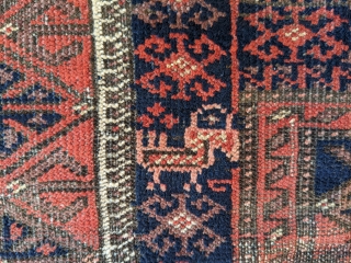 Early 1900s Yaqub Khani Baluch rug with a few chickens woven in. Natural dyes with a great purple.               