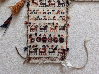 Early 1900s. Qashqai horse blanket or cover. 4ft7in x 5ft. Wonderful repeating animal figures with a few silk braids woven in here and there. A few scattered small holes but overall great  ...