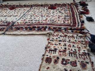 Early 1900s. Qashqai horse blanket or cover. 4ft7in x 5ft. Wonderful repeating animal figures with a few silk braids woven in here and there. A few scattered small holes but overall great  ...