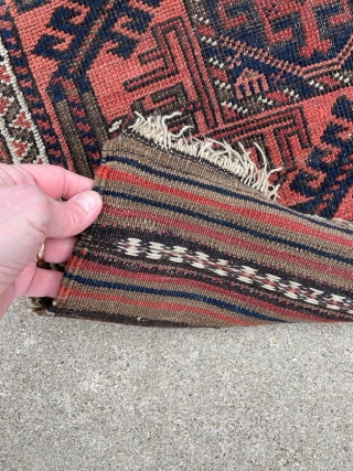 Recently acquired nice Baluch rug. I especially like the kilims and the filler motifs and animals on the outer sides of the field.

3'0" x 4'11"        