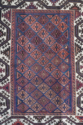 Beautiful white border Baluch rug in a small format. 3'1" x 4'7" or 94 x 140cm. Please message me for more details at: gerrerugs@gmail.com or steven.malloch@gmail.com       