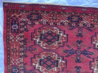 Mid 19th century Ersari / Kizilayak chuval. Beautiful cherry red field color, unusual flower minor border. 2'10" x 4'6" Two small repairs, natural colors. I took the photos in two lighting conditions,  ...