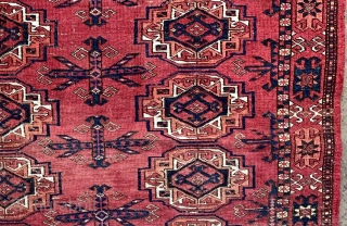 Mid 19th century Ersari / Kizilayak chuval. Beautiful cherry red field color, unusual flower minor border. 2'10" x 4'6" Two small repairs, natural colors. I took the photos in two lighting conditions,  ...