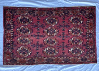 Mid 19th century Ersari / Kizilayak chuval. Beautiful cherry red field color, unusual flower minor border. 2'10" x 4'6" Two small repairs, natural colors. I took the photos in two lighting conditions,  ...