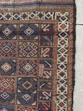 Archaic looking Baluch with incredible range of colors. Look at that main panel on the right!  Maybe a student practice piece or some kind of script?  3ft 11in x 2ft  ...