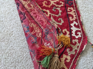 Antique Uzbek Lakai silk embroidered trapping that was used on the end of tent poles. Beautiful piece with original silk tassles.

1'1" x 2'4" (to bottom of the lower tassle)

Cheers.    