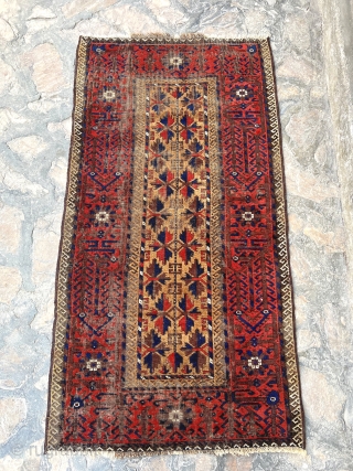 Antique camel hair Baluch rug. 3'0" x 5'2". All ends secured and much of the "wear" is from the oxidized browns. No holes.          