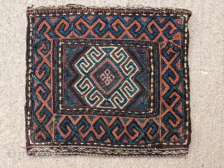 Gorgeous sumak Antique Baluch bag/ chanteh. 11" x 11.5" or 28 x 29cm. This is one of more attractive pieces I've owned. I've also heard similar pieces labeled as Chahar Aimaq.

Cheers.  