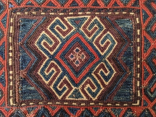 Gorgeous sumak Antique Baluch bag/ chanteh. 11" x 11.5" or 28 x 29cm. This is one of more attractive pieces I've owned. I've also heard similar pieces labeled as Chahar Aimaq.

Cheers.  