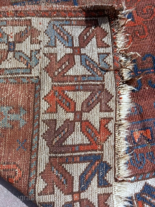 Very old 19th century symmetrically knotted Baluch rug. Beautiful drawing and colors.                     