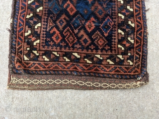 Gorgeous 19th century Baluch balisht. Complete piece with front, back, and goat hair loops. These small bags are a true work of art. 1'6" x 3'2" or 46 x 92cm

Cheers.   