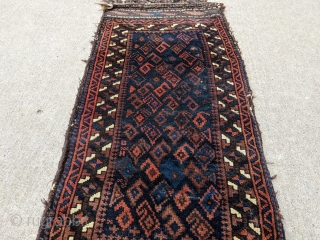 Gorgeous 19th century Baluch balisht. Complete piece with front, back, and goat hair loops. These small bags are a true work of art. 1'6" x 3'2" or 46 x 92cm

Cheers.   