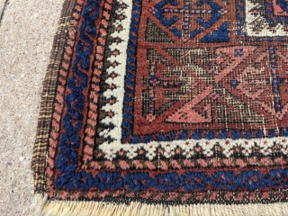 Antique Timuri Baluch rug by the Yaqub Khani subtribe. 3'5" x 6'3" or 104 x 198 cm. Original sides with oxidized dark browns. Many wonderful motifs in the center field of this  ...