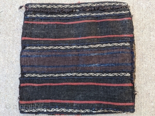 Antique Baluch bag, maybe a chanteh. Sweet little piece that's complete with really soft wool. 15.5" x 16" or 40x41cm.

Chers.             