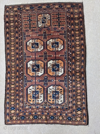 Old Baluch prayer rug with Tekke guls. 3'2" x 4'9" or 97 x 145cm. Soft, shiny, and fluffy wool. Great condition. 

Cheers.           