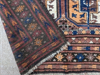 Old Baluch prayer rug with Tekke guls. 3'2" x 4'9" or 97 x 145cm. Soft, shiny, and fluffy wool. Great condition. 

Cheers.           