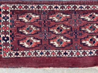 Antique Yomut mafrash with bat border and unusual secondary guls. 1'3" x 2'4" or 72 x 38cm.                