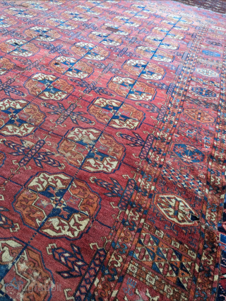 Mid 19th century Tekke main rug. 317 x 217 cm or 7'2" x 10'5". Scattered small holes that were secured. 

Please contact me at steven.malloch@gmail.com or gerrerugs@gmail.com for purchase or questions.  
